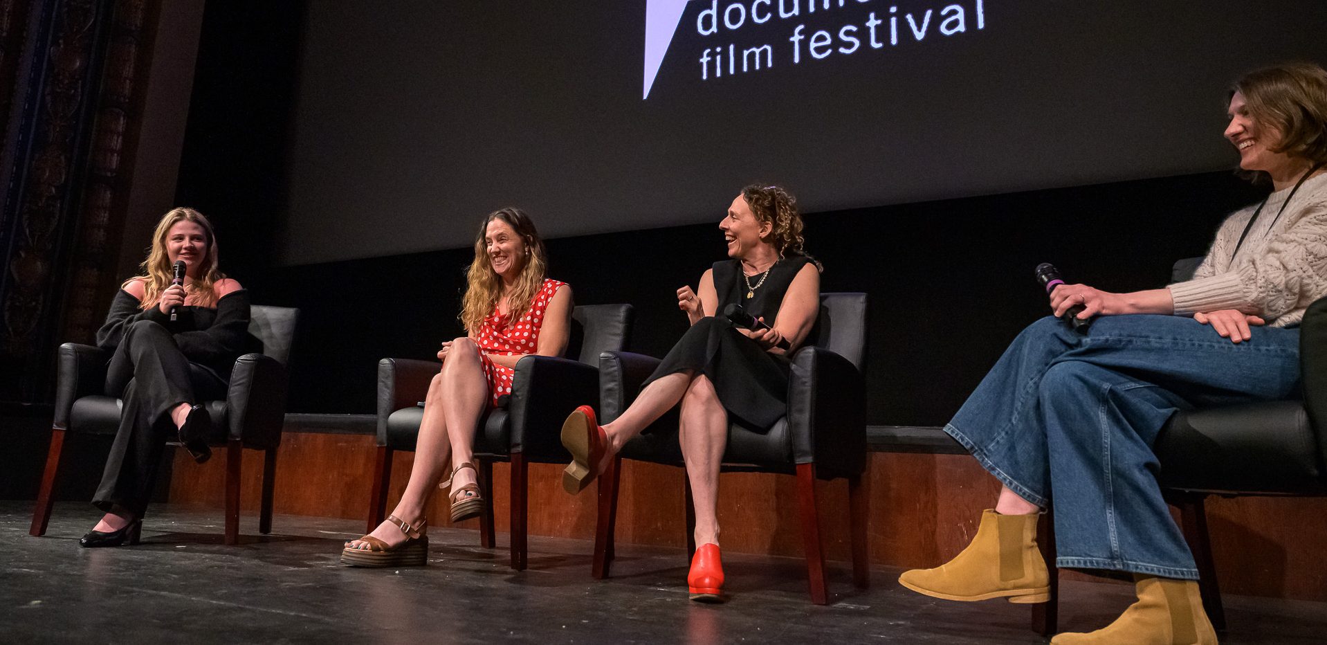 The FOLKTALES film team participates in an animated Q&A after their 2025 screening. Photo: C. Bay Milin.